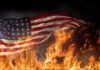 Man CHARGED With Lighting American Flags On Fire